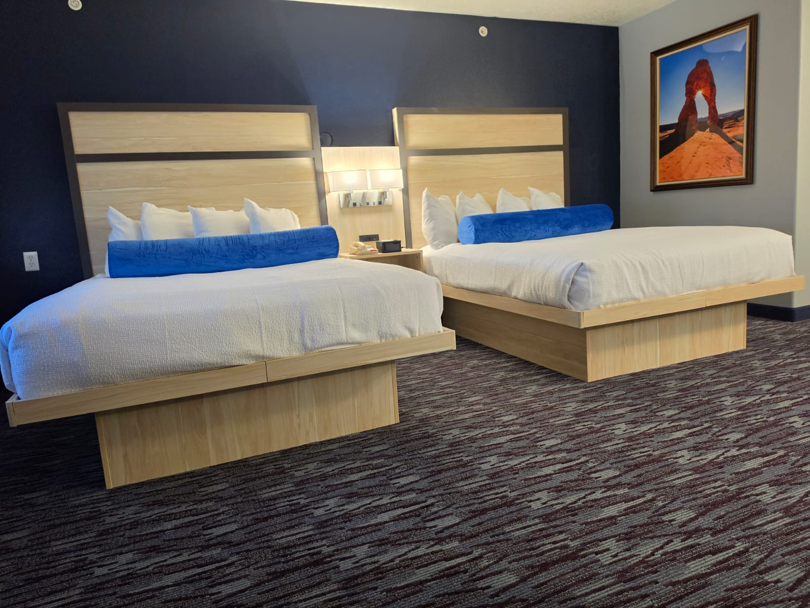 Two queen beds with framed Utah landscape artwork — Best Western Vernal Inn, Vernal Utah