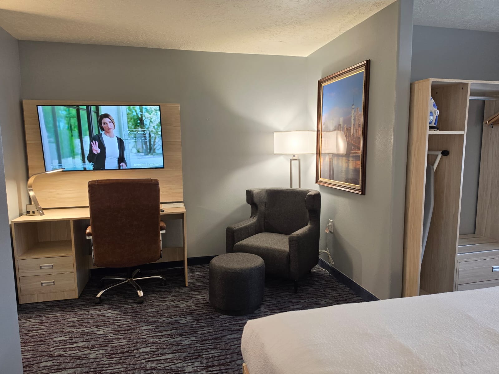Desk, office chair, TV and armchair in a guest room — Best Western Vernal Inn, Vernal Utah