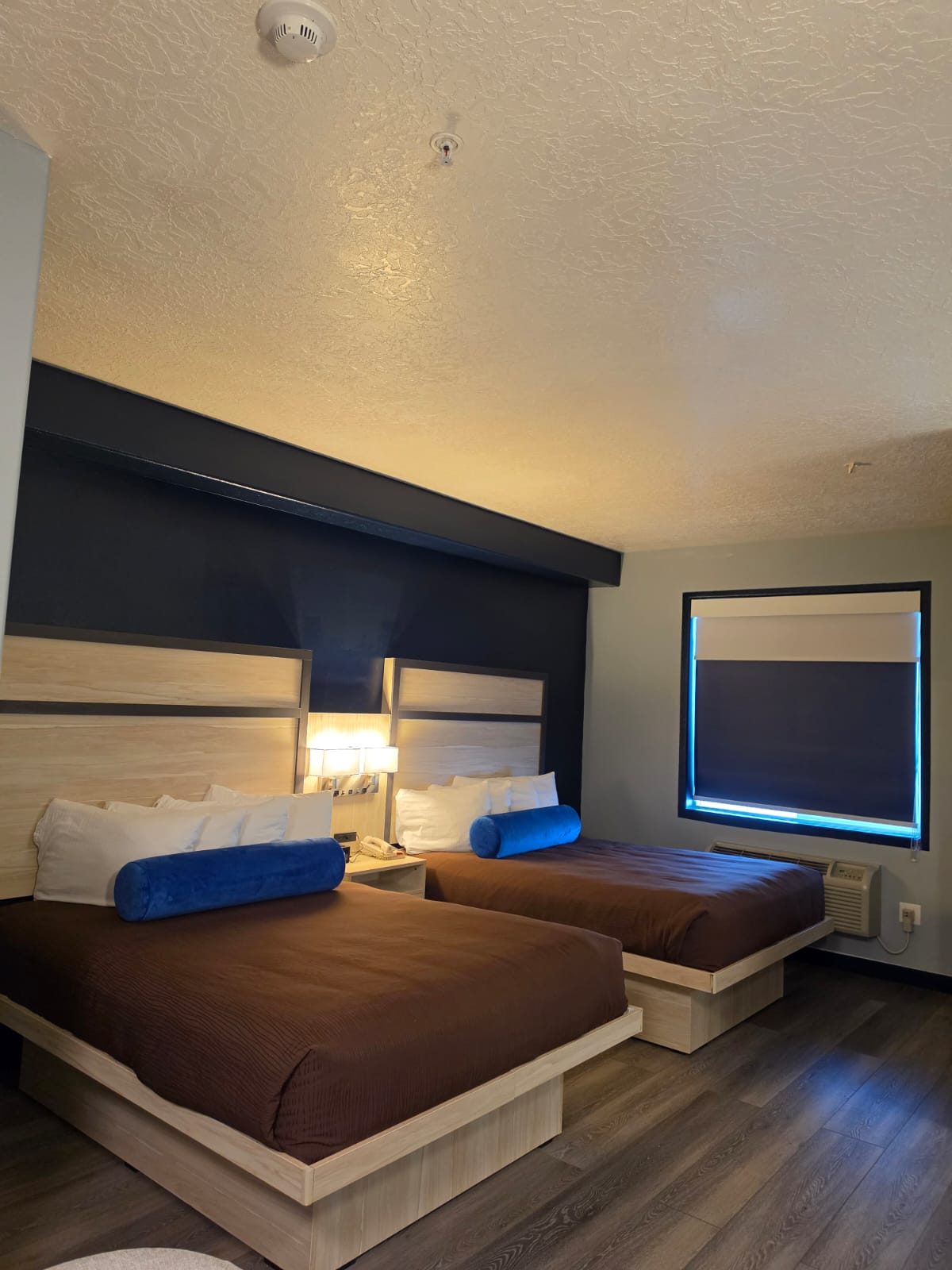 Pet-friendly room with two beds, window and heating and cooling unit — Best Western Vernal Inn, Vernal Utah