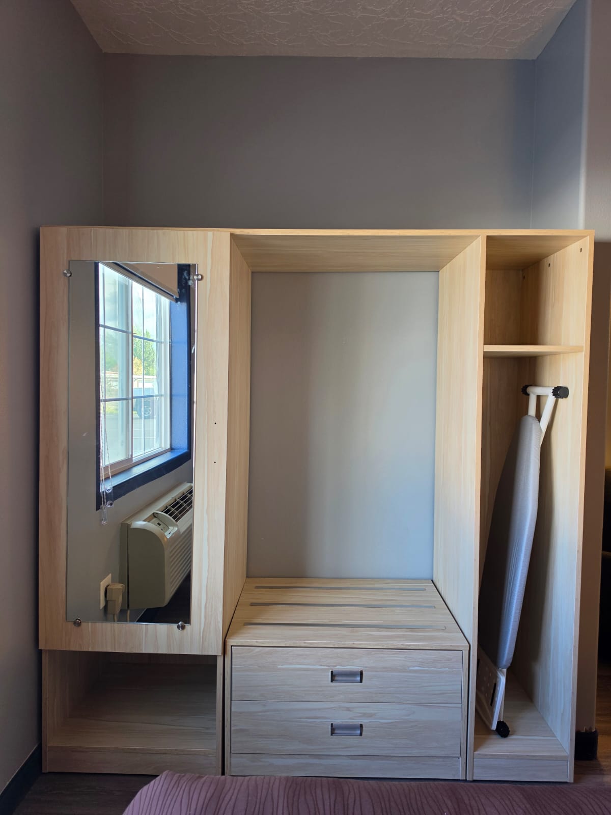 Closet unit with full-length mirror, hanging bay, drawers and ironing board — Best Western Vernal Inn, Vernal Utah