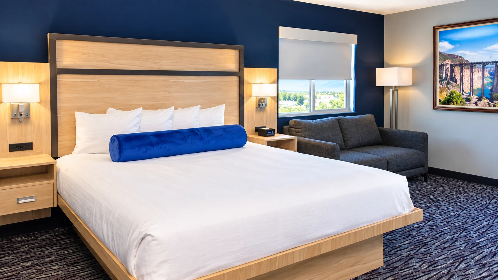 Studio Queen with a queen bed and a sofa — Best Western Vernal Inn, Vernal Utah